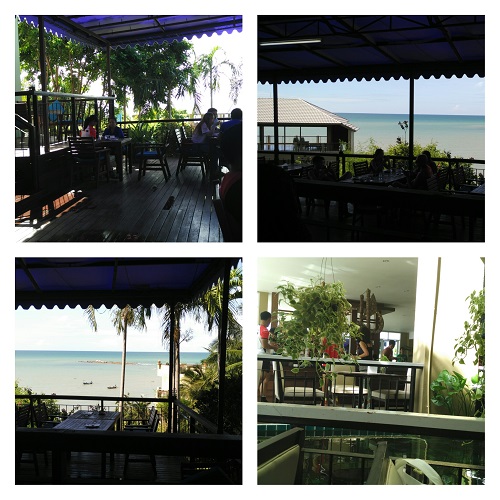 enjoying breakfast at hotel cafe with sea view after run at Royal Phala Cliff Beach